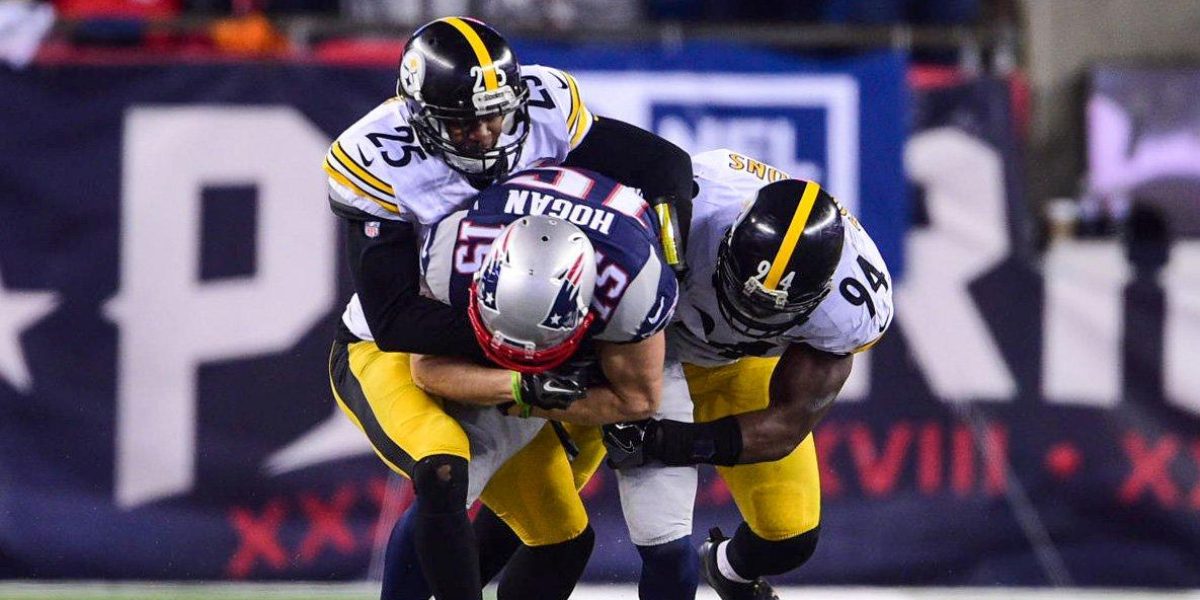 Artie Burns and Lawrence Timmons tackle Patriots Chris Hogan