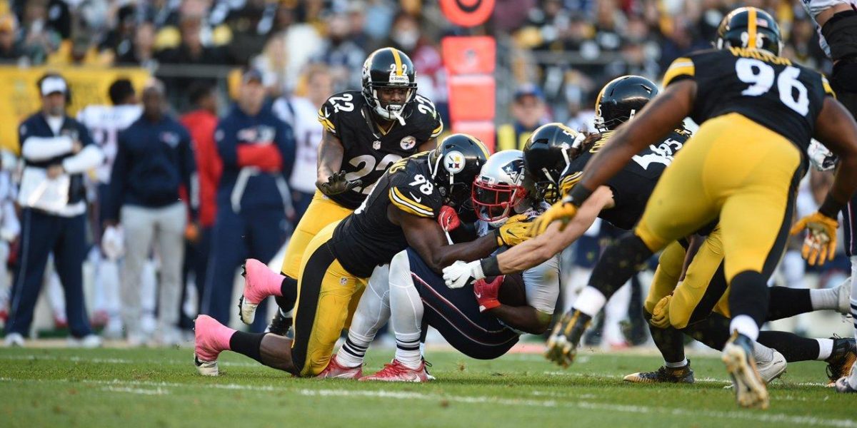 LeGarrette Blount tackled by a gang of Pittsburgh Steelers