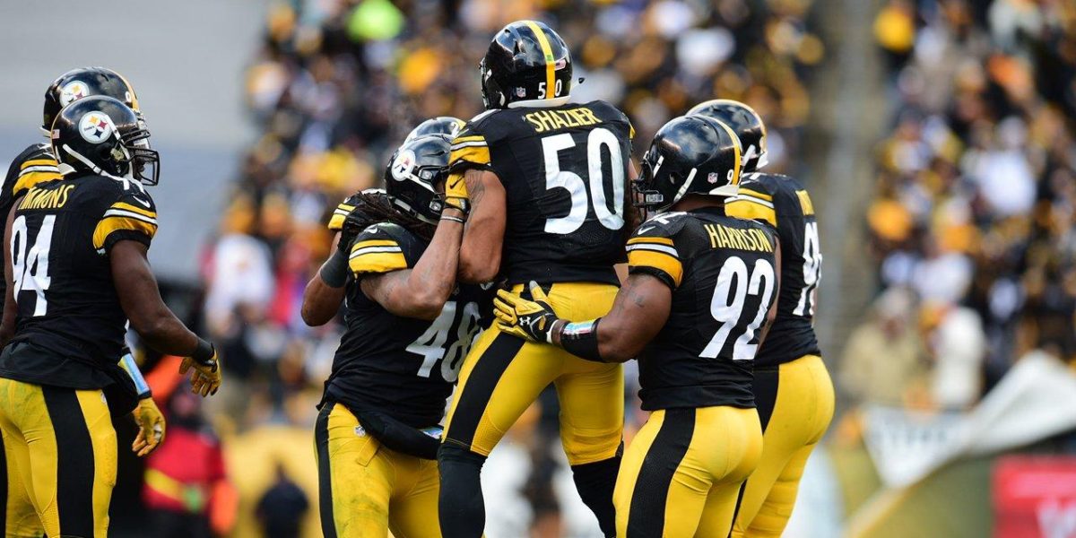 Pittsburgh Steelers linebackers celebrate after a turnover