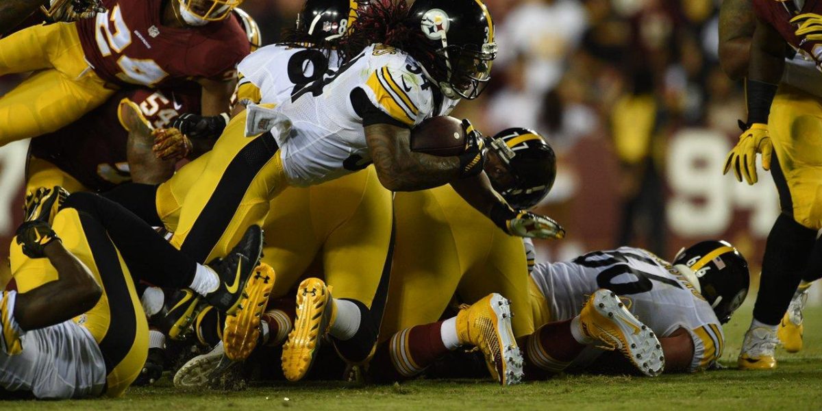 DeAngelo Williams stretches for extra yards