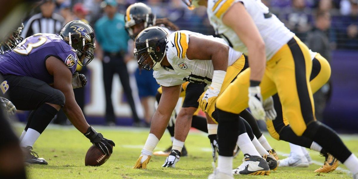 Pittsburgh Steelers and Baltimore Ravens at the line of scrimmage