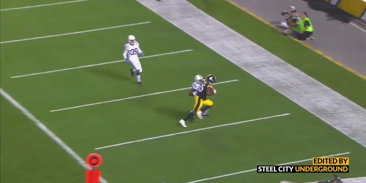 Xavier Grimble catches a touchdown pass against Colts