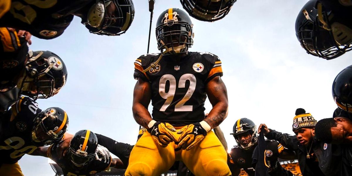 Steelers linebacker James Harrison pumps up the defense ahead of the game against the New England Patriots in Week 15