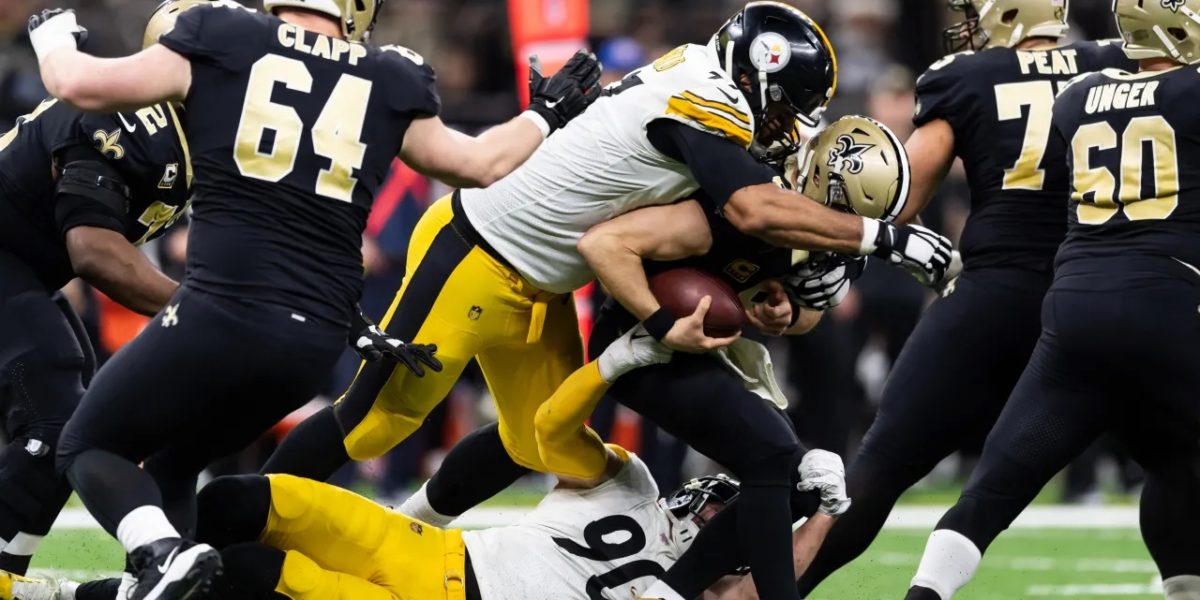Cam Heyward and T.J. Watt of the Pittsburgh Steelers sack Drew Brees of the New Orleans Saints in Week 16 of the 2018 NFL regular season (Dec. 23, 2018)