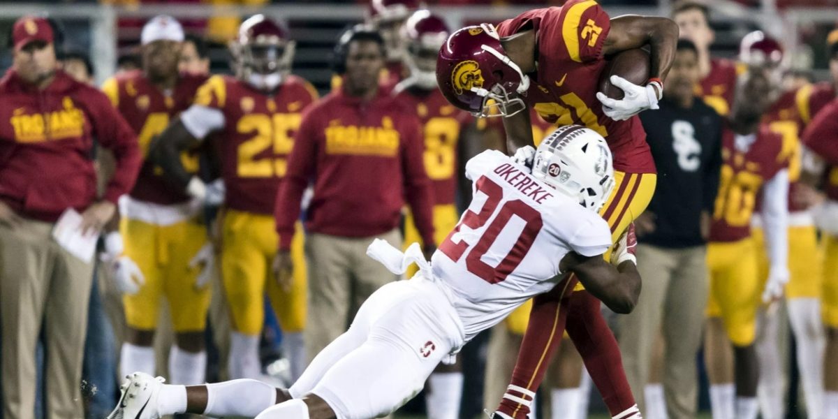 Stanford Cardinals linebacker Bobby Okereke makes a tackle on a USC player