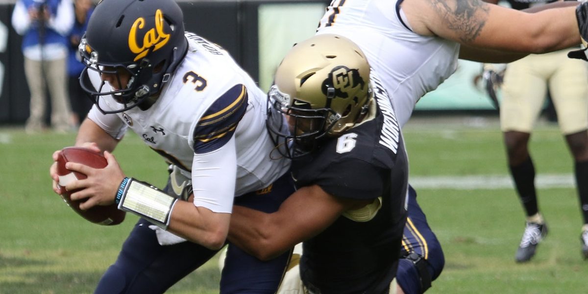 University of Colorado safety Evan Worthington makes a sack against Cal