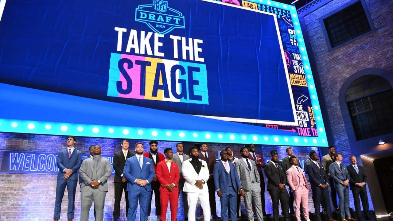 Collegiate players on stage with NFL commissioner Roger Goodell ahead of the 2019 NFL Draft (USA Today Sports)