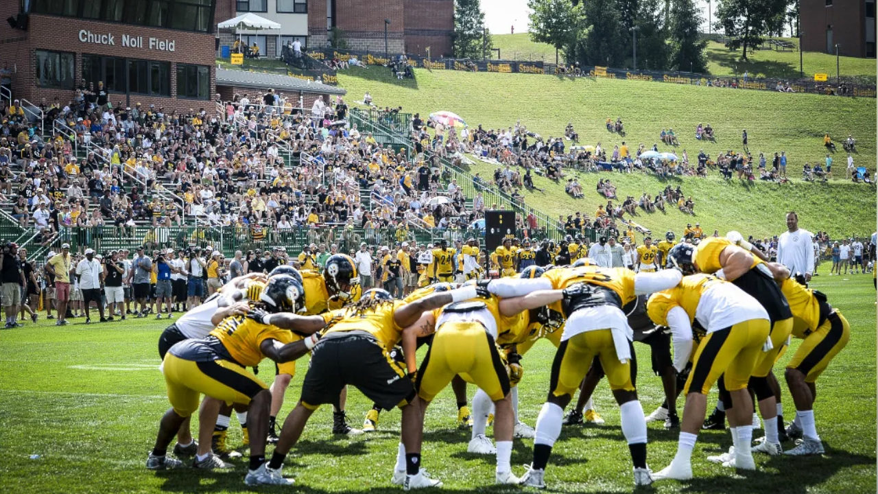 The Pittsburgh Steelers huddle at Chuck Noll Field