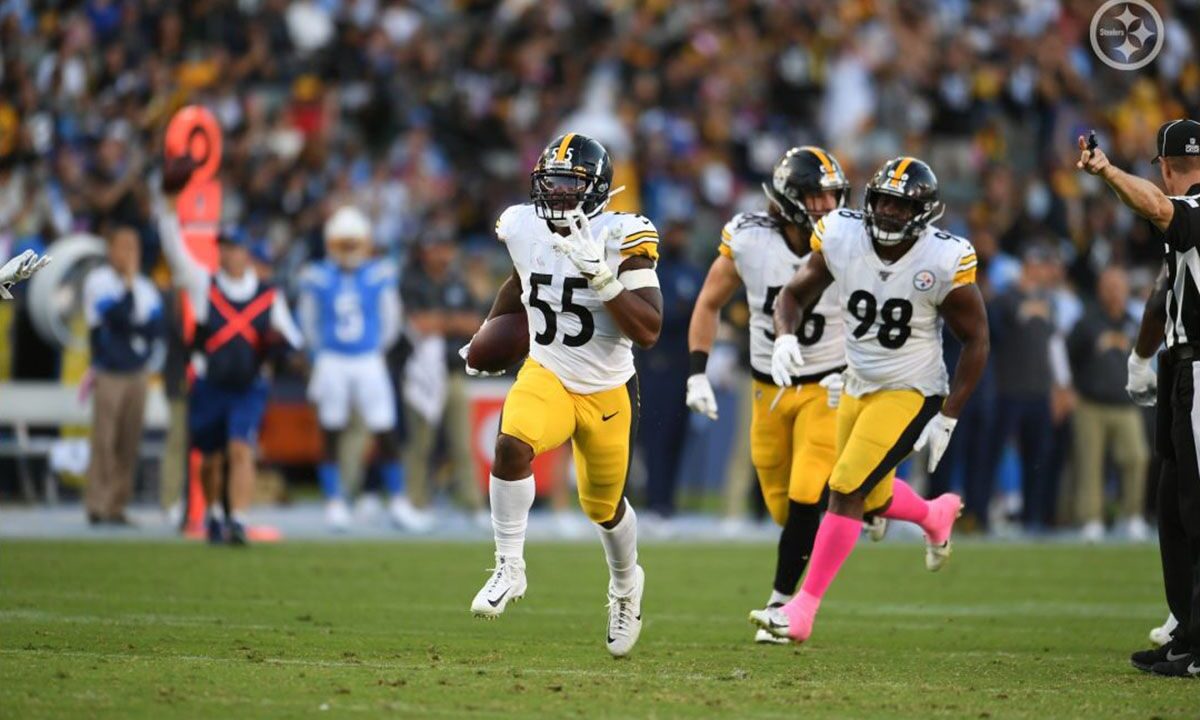 Steelers linebacker Devin Bush (55) grabs a loose ball versus the Los Angeles Chargers in Week 6 of the 2019 NFL Regular Season