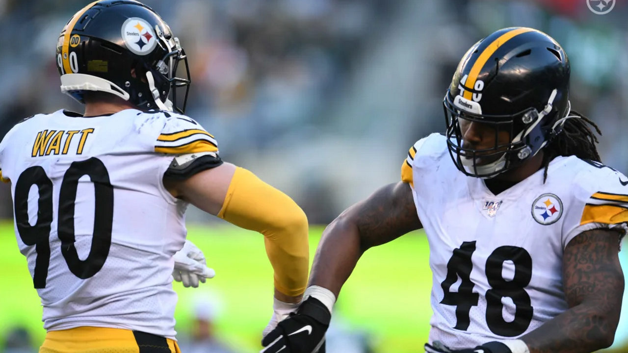 Pittsburgh Steelers linebackers Bud Dupree and T.J. Watt celebrate a play during Week 16 of the 2019 NFL regular season against the New York Jets