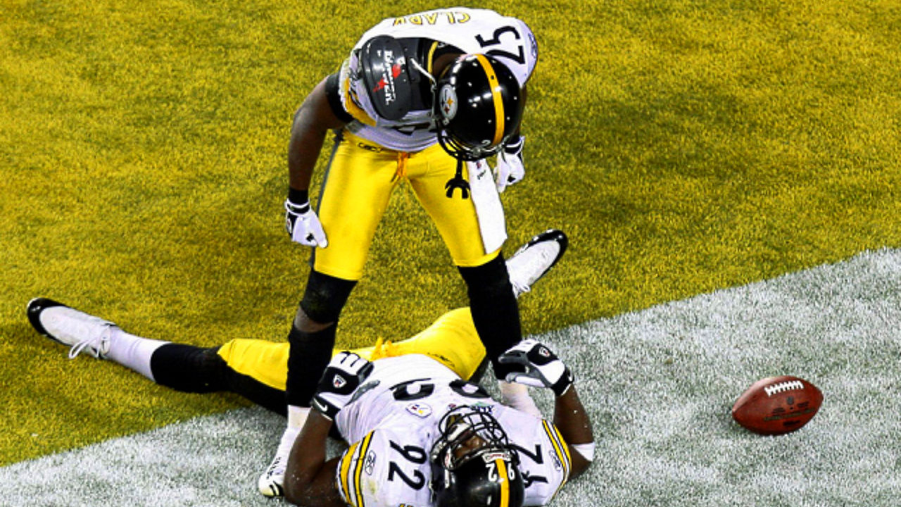 Pittsburgh Steelers defensive back Ryan Clark celebrates with teammate James Harrison