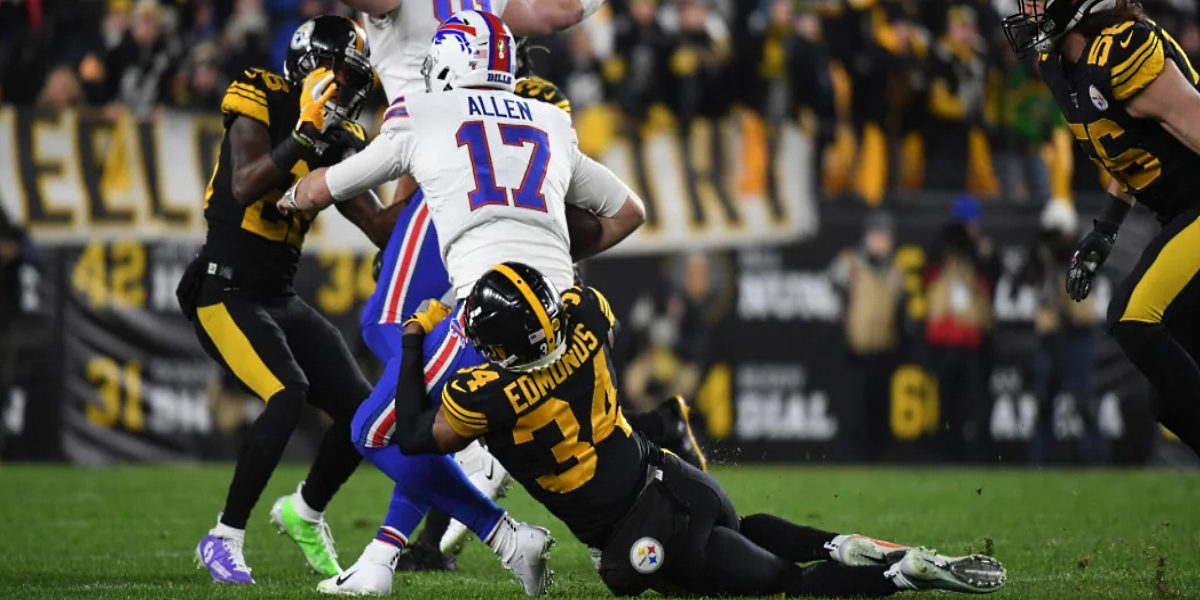 Pittsburgh Steelers safety Terrell Edmunds tackles Buffalo Bills quarterback Josh Allen during Week 15 of the 2019 NFL regular season