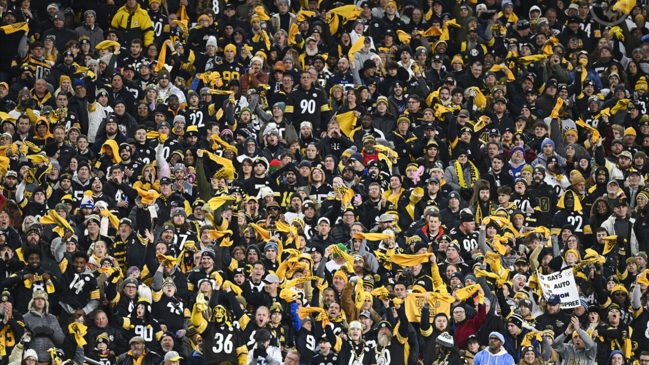 Pittsburgh Steelers fans wave their cherished 'Terrible Towels' at Heinz Field during an NFL playoff game